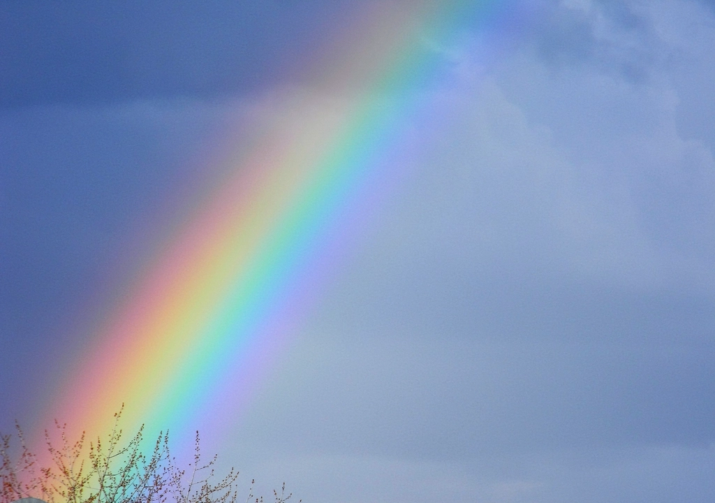 Rainbow cloudy sky