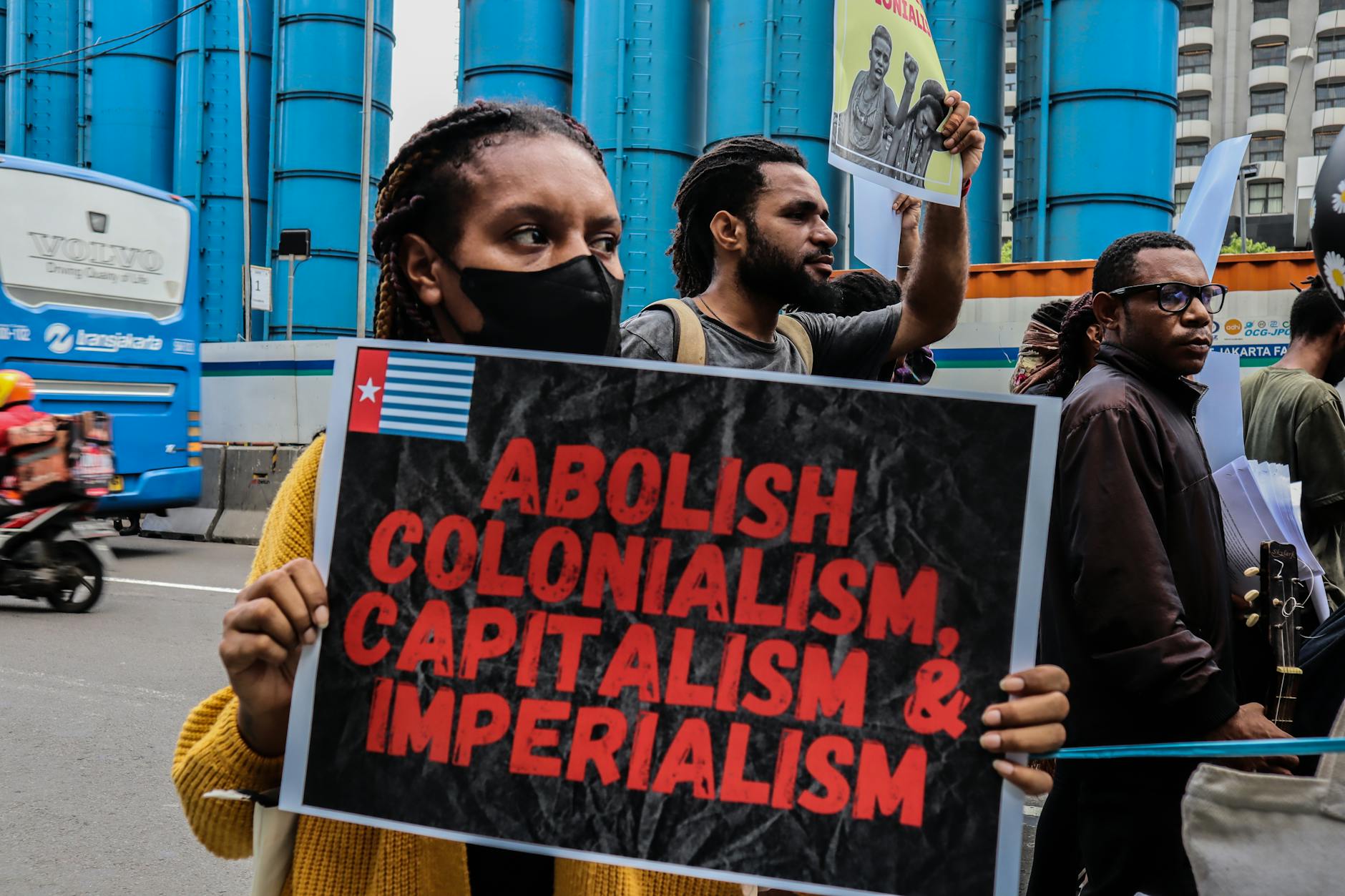 woman during rally with placard